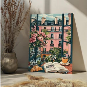 Peut inclure: Une peinture repr&eacute;sentant une vue de fen&ecirc;tre sur un b&acirc;timent rose avec un balcon et des plantes vertes. La fen&ecirc;tre est ouverte et il y a une tasse de caf&eacute; sur une table avec un livre et un croissant. Le texte sur le b&acirc;timent dit "Folie Douce"