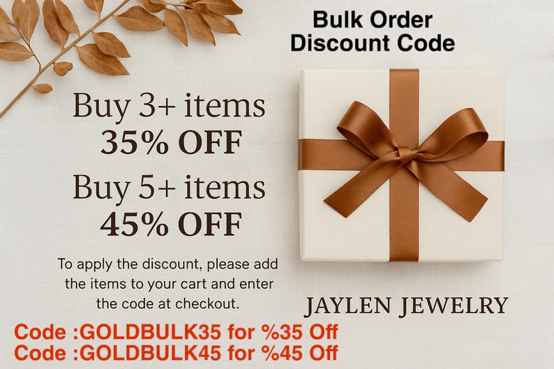 May include: A white gift box with a brown ribbon and bow, with text indicating bulk order discounts. The text includes "Buy 3+ items 35% OFF" and "Buy 5+ items 45% OFF". The brand name "JAYLEN JEWELRY" is also visible.