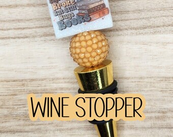 Beaded Wine Stopper - "Suspect Claims She's Broke But Still Buys Books" (Gold)
