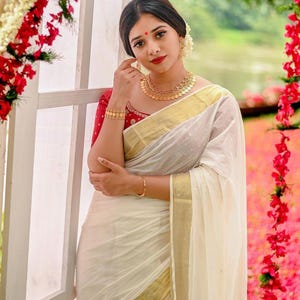 Women&#39;s Traditional kasavu Saree,