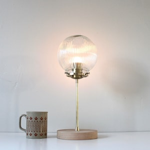 Brass Table Lamp, Ribbed Clear Glass Bubble Globe Shade, Wooden Base, Mid Century Modern Design, Home Lighting and Decor, 15 Inches Tall