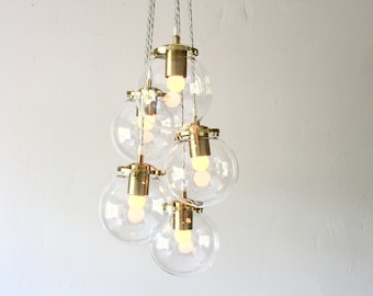 Globe Chandelier Lighting Fixture - Five Clear Glass Bubble Clustered Pendant Lights - Brass Finish - Mid Century Modern Lamps & Home Decor