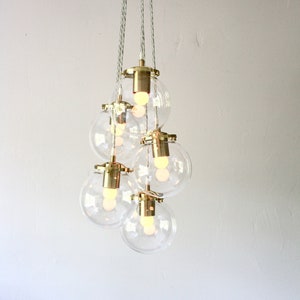 Globe Chandelier Lighting Fixture - Five Clear Glass Bubble Clustered Pendant Lights - Brass Finish - Mid Century Modern Lamps & Home Decor