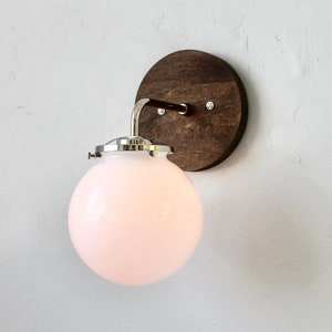 Wall Sconce Lamp, Mid Century Modern Wall Mounted Lighting Fixture, White Glass Globe Shade, Wood Base, Polished Nickel, Wire-In or Plug-In