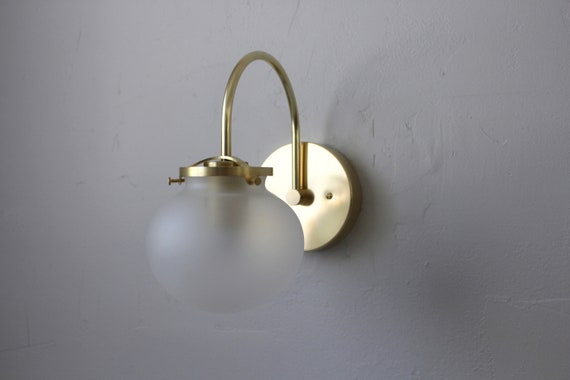 Frosted 2024 globe sconce