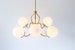 Brass Chandelier Lighting Fixture, Brass Pendant Lamp, 6 White Glass Globes on Fluted Arms, BootsNGus Modern Lighting and Home Decor 