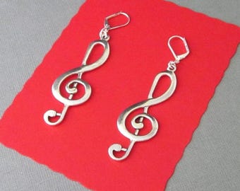 Pendientes grandes con forma de clave de sol y cierre de palanca: Joyería musical llamativa
