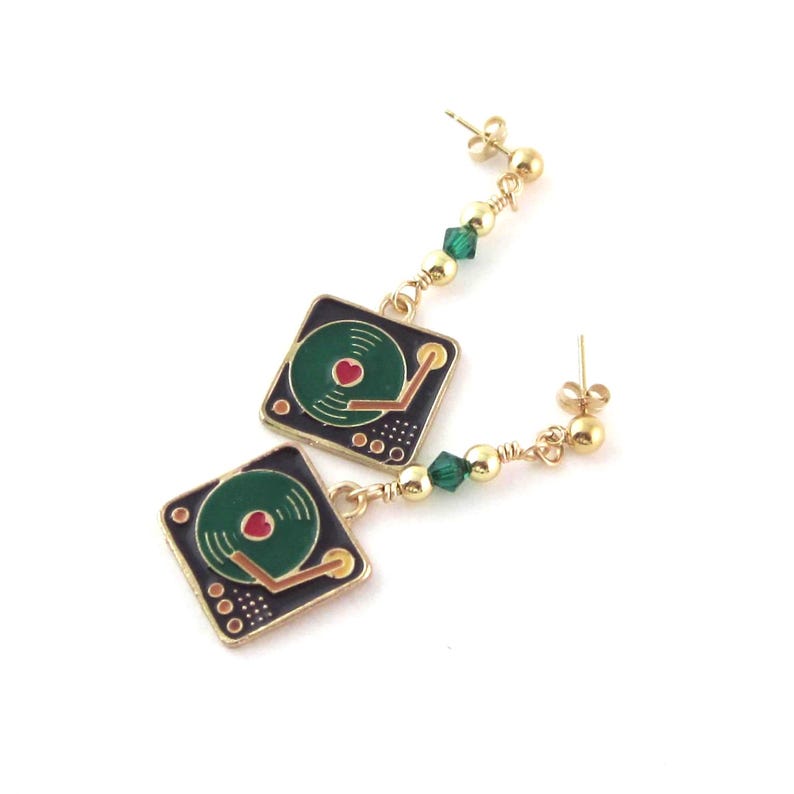 Black, green and gold retro record player charm earrings with green crystals, 14k gold filled beads and 14k gold filled posts and ear back clutches. Earrings are 1 7/8 inches long, the charms are 5/8 inch square. Crystals and beads are 4mm.