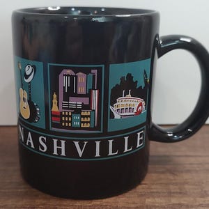 Nashville TN Souvenir Mug Cup Black Ceramic Guitar River Boat Skyline