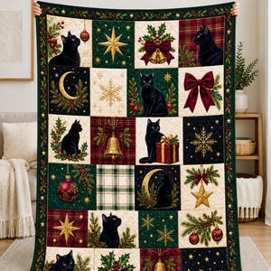 May include: A rectangular quilt featuring a grid of festive squares with black cats, gold stars, snowflakes, red bows, bells, and ornaments. The design includes dark green, red, and cream colors with a dark green border decorated with holly berries.