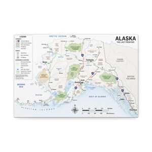 May include: A detailed map of Alaska titled Alaska The Last Frontier, featuring major cities, national parks, highways, and bodies of water. The map includes a legend, a compass rose, and a scale bar showing distances in miles and kilometres.