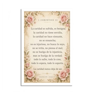 May include: A rectangular wall art print featuring the text 1 Corintios 13 in Spanish, surrounded by a decorative border of soft pink roses and green leaves on a cream-colored background. The text includes the full passage from Reina-Valera 1909.