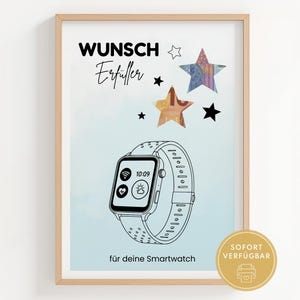 May include: A framed print with a light blue background features a black and white illustration of a smartwatch. The text "Wunsch Erfüller" and "für deine Smartwatch" is displayed above and below the watch. Colourful star shapes are also included.