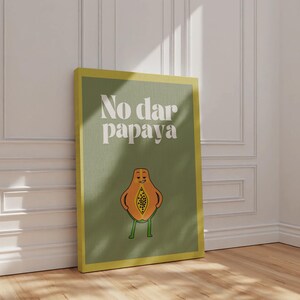 May include: A green canvas print with the text "No dar papaya" in white letters. A cartoon papaya with a face and legs is depicted below the text.