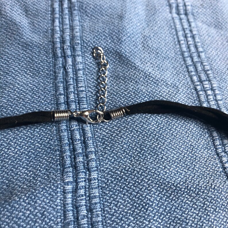 Carved Triskelion Vertebrae Necklace