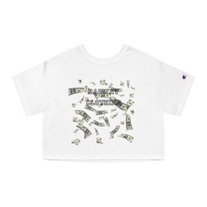 May include: White cropped t-shirt with a graphic of falling dollar bills and the text "BAGWAY CLOTHING" printed on the front.