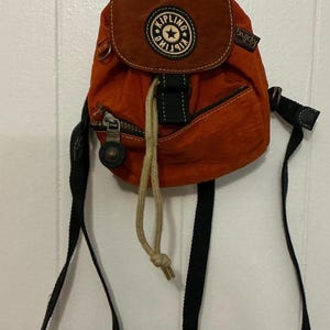 A Very Rare Nylon Vintage Burnt Orange Small Kipling Backpack Rucksack Bag