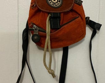 A Very Rare Nylon Vintage Burnt Orange Small Kipling Backpack Rucksack Bag