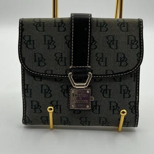 A Very Rare Vintage Black Dooney And Bourke Classic Clasp Wallet