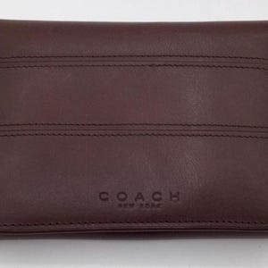 Una billetera Coach Snap HTF de cuero marrón vintage poco común