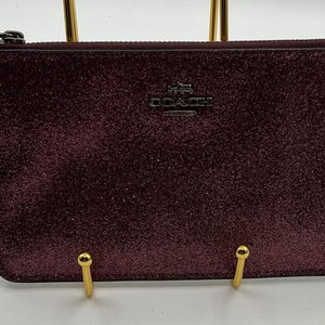 Ein seltenes HTF Vintage funkelndes weinrotes Glitter Coach New York Zip Armband