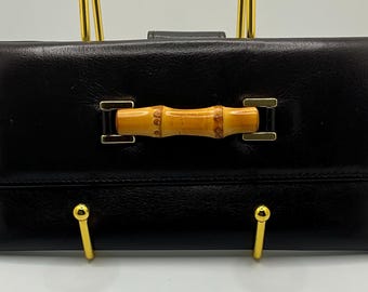Un très rare portefeuille à pression en bambou et cuir Gucci soufflé foncé foncé