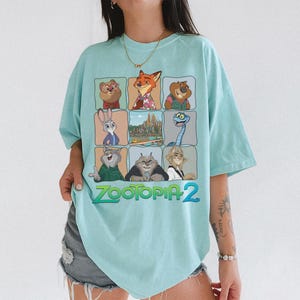 Zootopia 2 Characters T-shirt, Nick Wilde Judy Hopps Clawhauser Shirt, Zootopia 2 2025 Tee, Disneyland Family Trip Outfits bild 1