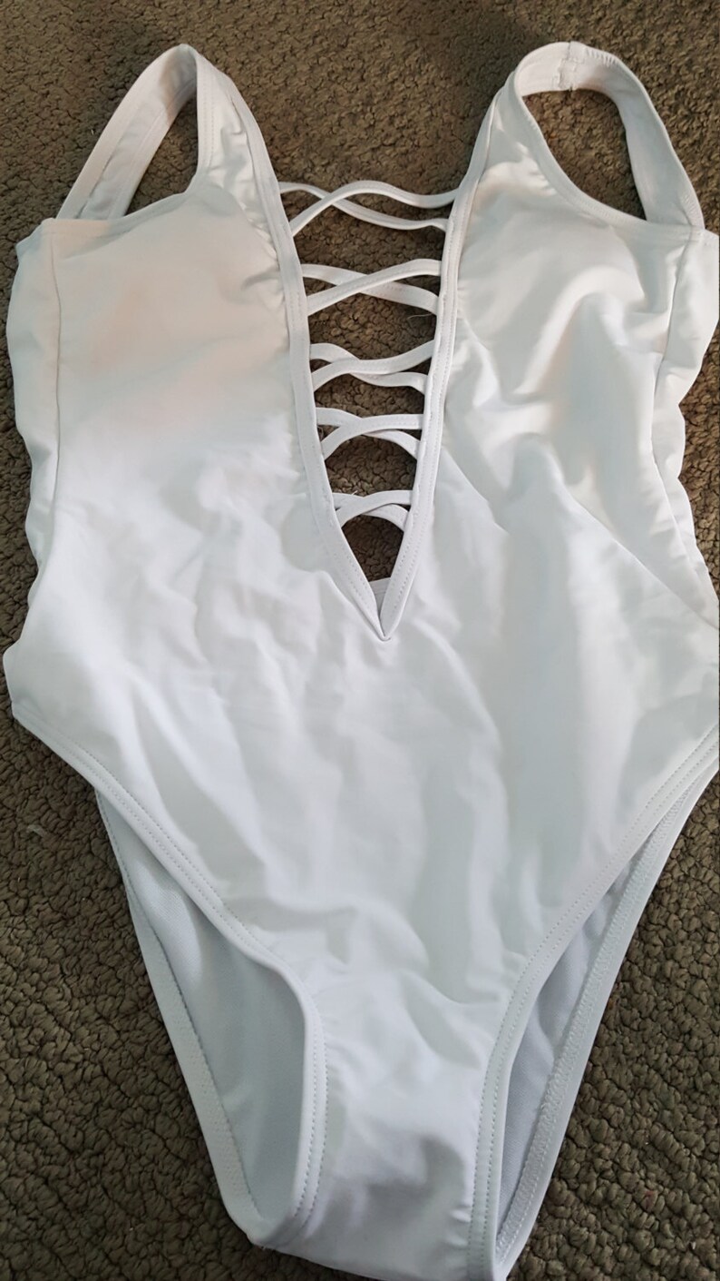 white swimming costume bride