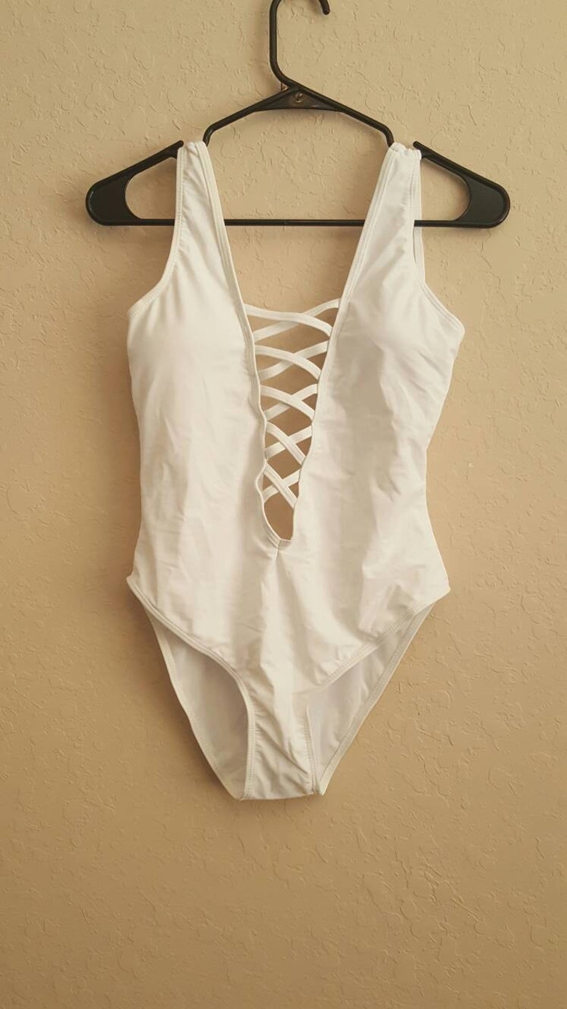 white swimming costume bride