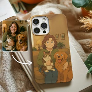 May include: A phone case with a cartoon illustration of a woman with two pets, a cat and a dog. The woman is sitting on a couch with the cat in her lap and the dog beside her. The phone case is brown with a gold trim around the camera lens.