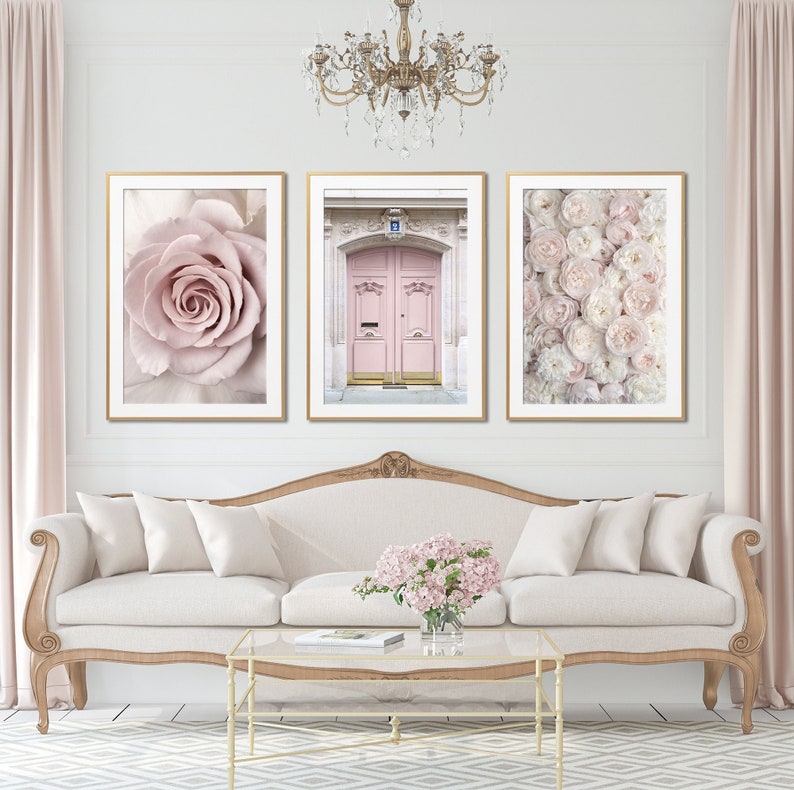 May include: Three framed prints with a pink rose, a pink door with gold accents, and a cluster of white and pink peonies.