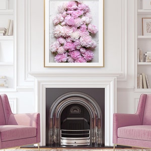 May include: A framed print of a cluster of pink and white peonies arranged in a vertical pattern. The peonies are in various shades of pink and white, and they are arranged in a way that creates a sense of depth and texture.
