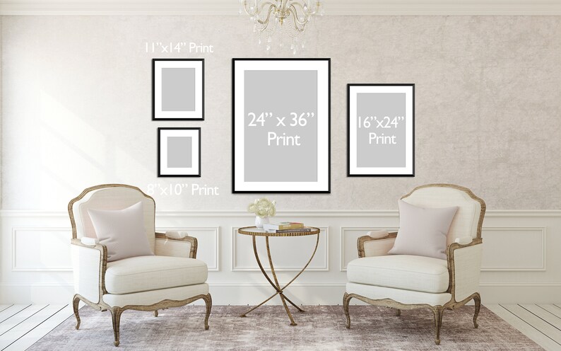 May include: A wall display featuring framed prints of various sizes: 20cm x 25cm, 28cm x 36cm, 41cm x 61cm, and 61cm x 91cm. The prints are displayed on a textured wall above two ornate armchairs and a small table. The text "Print" is visible on each frame.