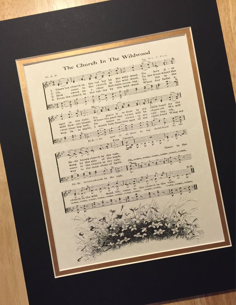 May include: A vintage sheet music print of the song "The Church In The Wildwood". The sheet music is printed on aged paper with a black and white illustration of wildflowers at the bottom of the page.