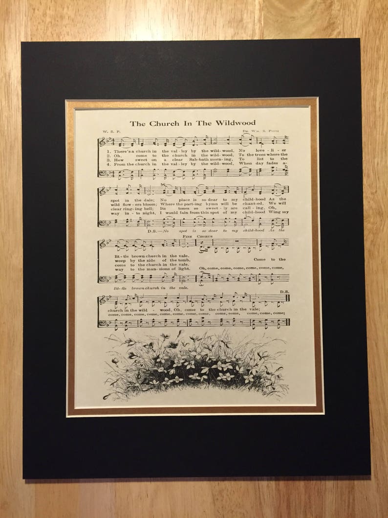 May include: A vintage sheet music page titled "The Church In The Wildwood". The sheet music features a black and white illustration of a church in a valley with trees and flowers. The lyrics are printed in black ink on a cream-colored background.