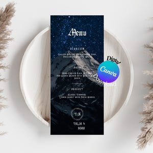 May include: A wedding menu card with a starry night sky background and a mountain range in the foreground. The menu includes a starter, main course, dessert, and the names Talia & Noah.
