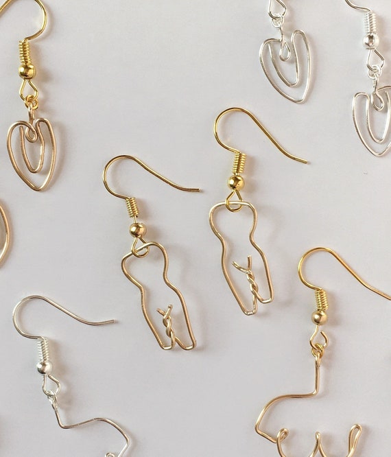 Female body earrings deals