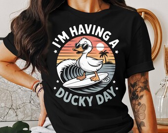 Surfing Duck T-Shirt: Beach Vacation Tee - Unisex Graphic Design