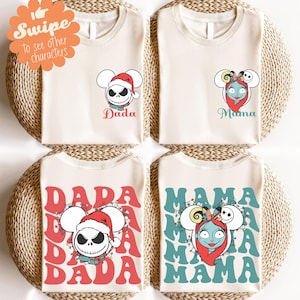 May include: Four cream-colored t-shirts with graphic designs. Two shirts feature Jack Skellington in a Santa hat with "Dada" text. The other two shirts show Sally with "Mama" text. The bottom shirts have the character's name in a larger font.