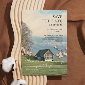 Peut inclure: Une carte d'invitation rectangulaire pour une pendaison de crémaillère avec une image de maison dans un champ herbeux, des montagnes et des fleurs de cerisier. Le texte indique : SAVE THE DATE 03.09.2028, 123 ANYWHERE ST. ANY CITY, WE HAVE JUST MOVED TO A DREAM HOUSE. COME AND CELEBRATE WITH US!, Housewarming party, RSVP 123-456-7890.