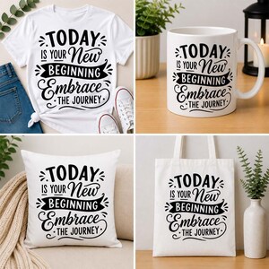 May include: A collection of white items with the text "TODAY IS YOUR NEW BEGINNING EMBRACE THE JOURNEY". Includes a t-shirt, coffee mug, throw pillow, and tote bag. The text is in a black, stylized font.