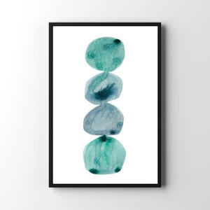 Modern abstract artwork of stacked pebbles in shades of blue and green. Original hand-drawn artwork using watercolour. Wall art for home