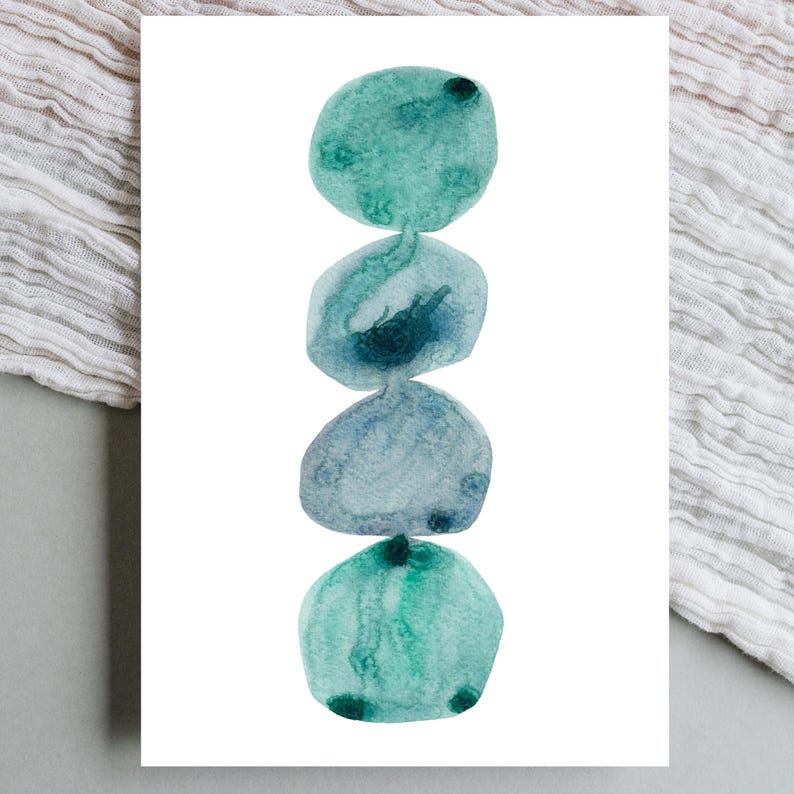 Modern abstract artwork of stacked pebbles in shades of blue and green. Original hand-drawn artwork using watercolour. Wall art for home