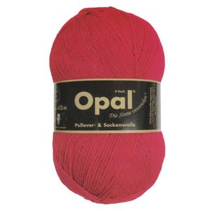 May include: A ball of bright red yarn labeled "Opal" with the text "4-fach Die Sinne verstricken Pullover & Sockenwolle" and "425 m" on the label.