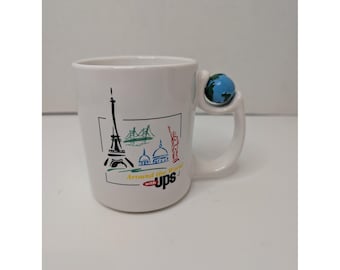 Vintage rare UPS Around the World Coffee Mug with Spinning Globe Handle Made USA