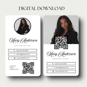 May include: A digital business card template with a black and white design. The card features a woman's headshot, contact information, and a QR code. The text on the card reads "Mary Anderson, Esthetician".