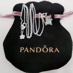 May include: A rustic wooden sign with the text "Welcome to our home" in a handwritten style. The sign has a distressed finish and a simple, inviting design, suitable for a front porch or entryway.