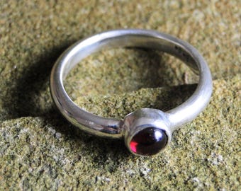 Silver ring with Garnet Cabochon UK size O