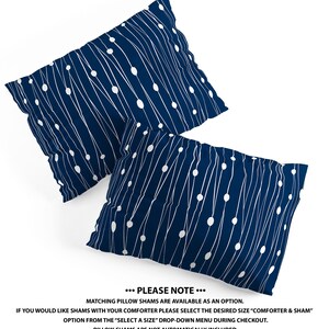 May include: Two blue pillowcases with a white abstract pattern of lines and dots. The text "... PLEASE NOTE ..." is at the bottom of the image. The text below reads "Matching pillow shams are available as an option. If you would like shams with your comforter please select the desired size "comforter & sham" option from the "select a size" drop-down menu during checkout. Pillow shams are not automatically included."