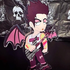 Figura acrílica de Synyster Gates con alas de murciélago ondulantes